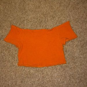 Orange crop top.